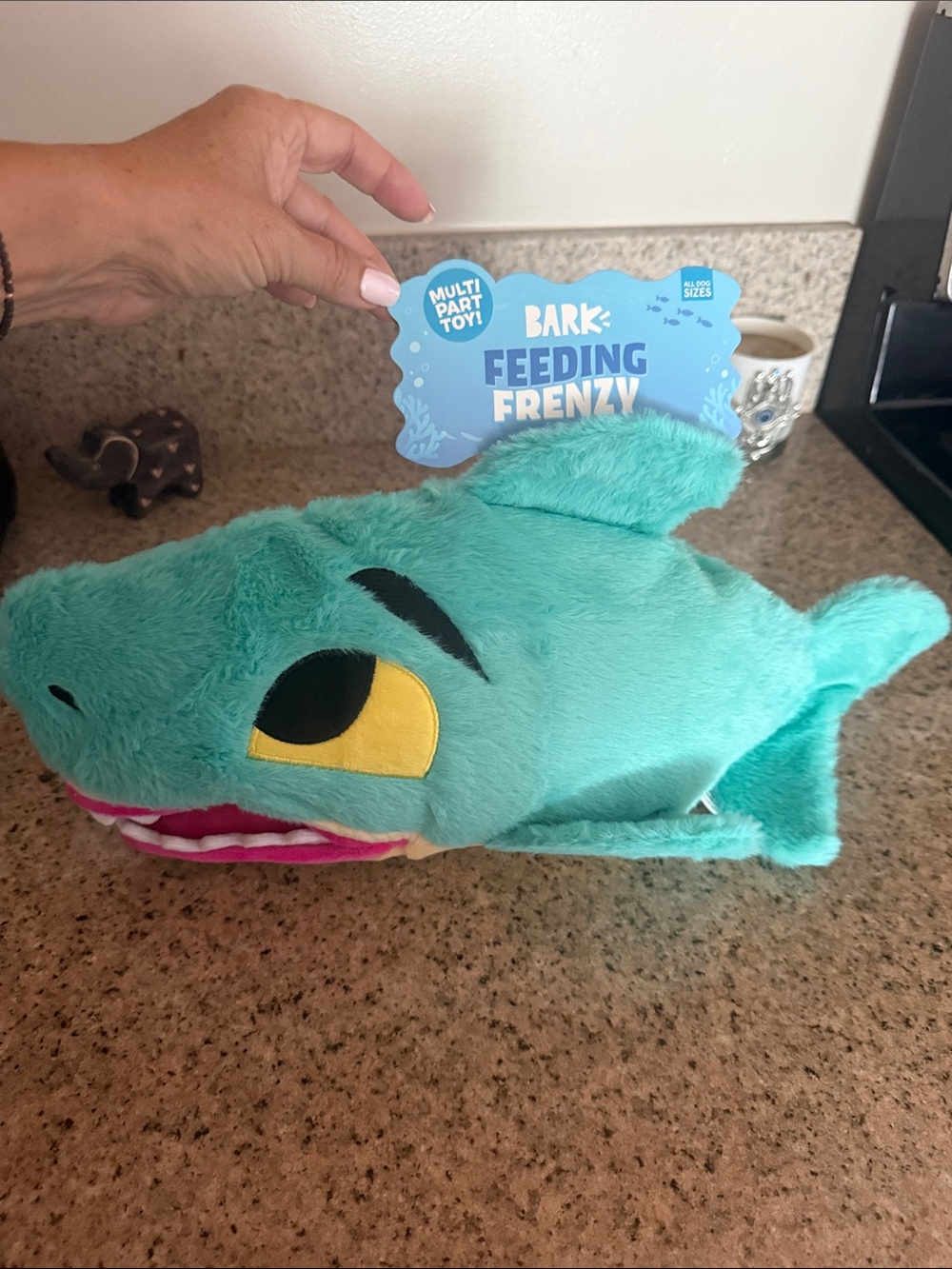 BARK Teal Shark Plush Dog Toy with Yellow Eye and Pink Mouth